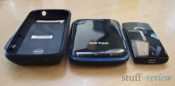 External battery roundup review: from left to right, PowerSkin protective case, New Trent IMP500 and Duracell Instant USB Charger