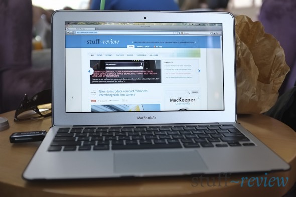 MacBook Air 2011 resting on a coffee table MacBook Air 2011 resting on a coffee table