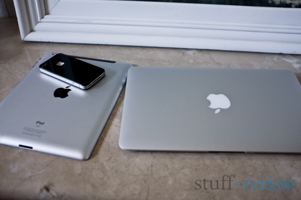 MacBook Air 2011, 11-inch next to an iPad 2 and iPhone 4