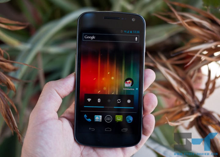 Samsung Galaxy Nexus in hand - on homescreen