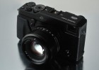 Fujifilm X-Pro1 camera with 35mm lens on surface