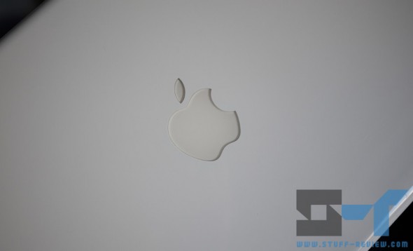 White plastic MacBook - Apple logo close-up