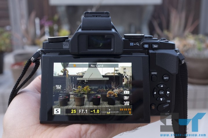 Olympus OM-D E-M5 digital camera back - titling OLED display